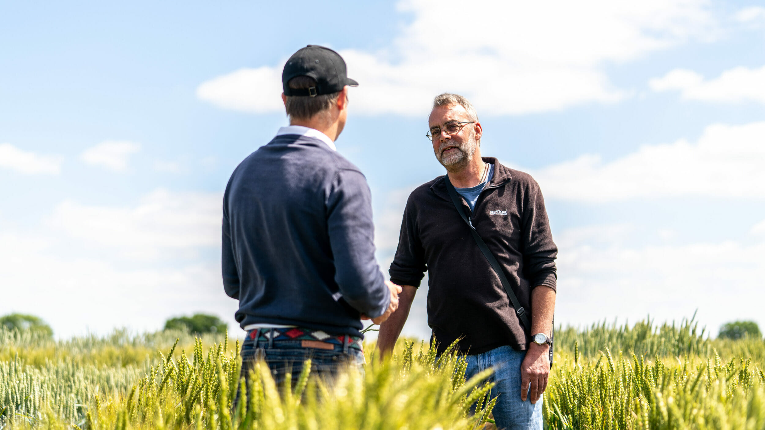 Tom Barker and Paul Rowe in wheat trial plots at Woolpit Suffolk