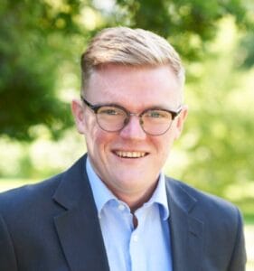 A headshot of James Webster Rusk
