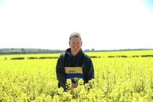 Andrew stood in his oilseed rape crop