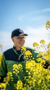 Paul inspecting his oilseed rape crop
