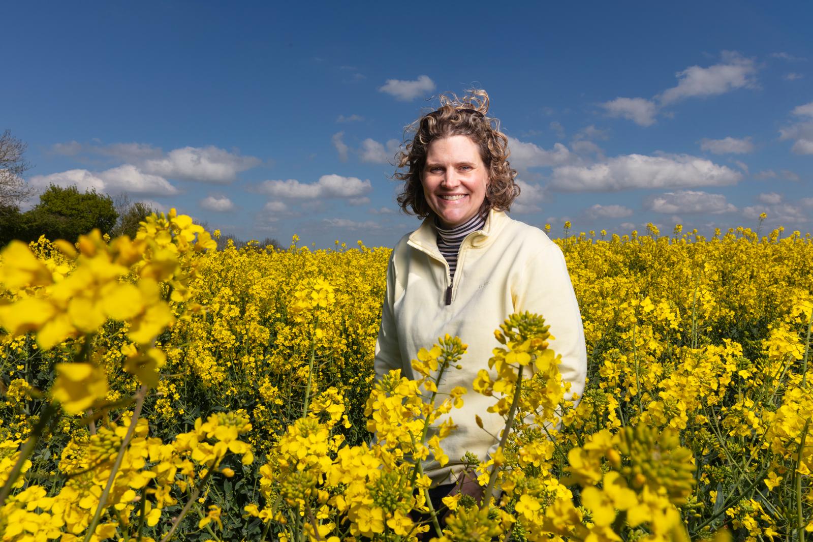 Sarahl Bell stood in a field of oilseed rape